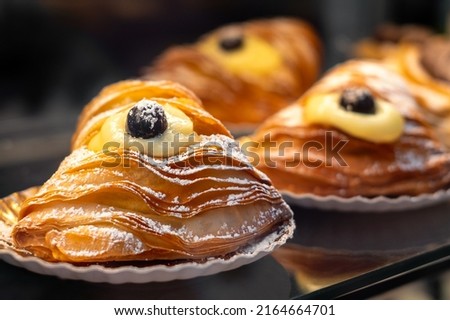 The famous sfogliatellla riccia (also called lobster tail in the US), a traditional shell-shaped, filled pastry from Naples, Italy.