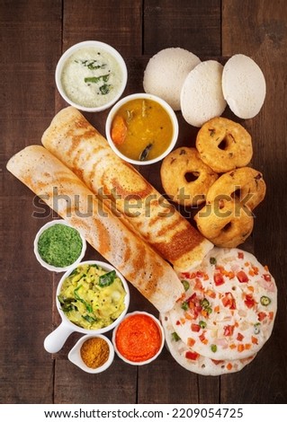 Famous south Indian food dosa idly vada oothappam with sambar coconut chutney and tomato chutney