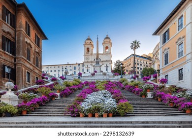 The famous Spanish Steps at Piazza di Spagna and Trinita dei Monti church at the top in Rome, Italy.