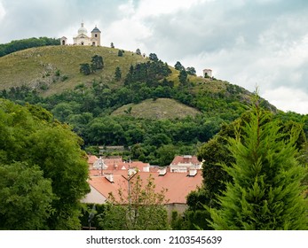 Famous St. Sebastian`s chapel Svaty Kopecek, view from Mikulov town tower. South Moravian region, Czech Republic