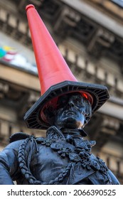 The famous statue of the Duke of Wellington, located on Royal Exchange Square in Glasgow, Scotland.  The statue is typically capped with a traffic cone which has become a tradition.