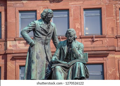 Famous Statue Grimm Brothers In The City Center Of The Hanau, Germany