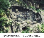 Famous Stone Sculptures of `Big Belly` Maitreya Buddha and Eighteen Lohan Monks at Lingyin Temple, Hangzhou, China. Lingyin Temple is one of the popular tourist destinations in Hangzhou.