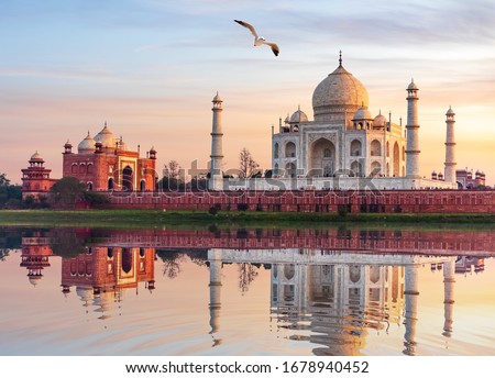 Famous Taj Mahal Mausoleum on the bank of the Yumana river in Agra, India