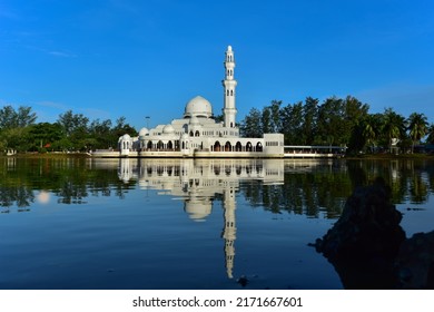 Famous Terengganu Floating White Mosque. Landscape With Beautiful, Still Water Reflection 