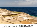 Famous touristic attraction in Gozo island the Salt Pans in  Xwejni Bay, Xwejni, Gozo island a part of the Malta islands.