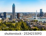 Famous travel destinations. Attractive view of renowned Erasmusbrug (Swan Bridge) in Rotterdam in front of port and harbour, Netherlands