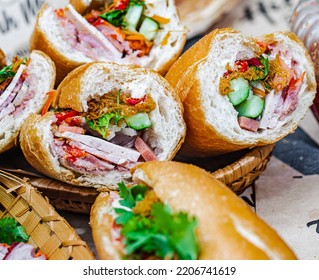 The Famous Vietnam Food : Vietnamese Bread -Banh My ,a popular meal at morning with carrot,meat,eggs omelet,stew beef or roast pork,cucumber - Shutterstock ID 2206741619