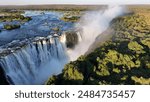 Famous Water Falls At Victoria Falls In Matabeleland North Zimbabwe. Giant Waterfalls. Nature Landscape. Victoria Falls At Matabeleland North Zimbabwe. Zambezi River. Travel Scenery.