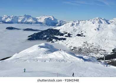 The Famous Winter Ski Resort Of Verbier In The Swiss Alps. In The Background The Dents Du Midi, In The Foreground Skiers And Fresh Snow.