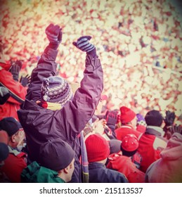 Fan Celebrating In The Stands At An American Football Game. Instagram Effect