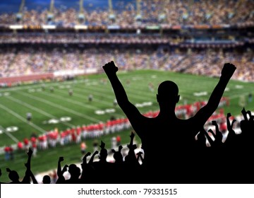 Fan celebrating a victory at a American football game.