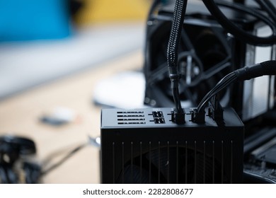 A fan connected to the computer as active cooling for the processor - Shutterstock ID 2282808677