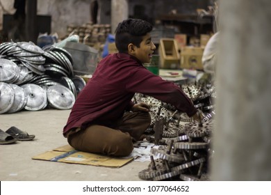 FAN FACTORY , GUJARAT - APRIL 10 , 2018 : Amir Is Doing Child Labor In A Fan Factory Where Is He Making Fan.