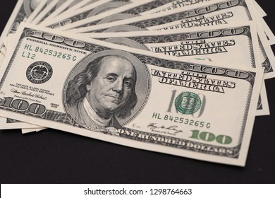 Fan Hundred Dollar Bills On Black Stock Photo (Edit Now) 1298764663