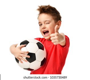 Fan Sport Boy Player Hold Soccer Ball In Red T-shirt Celebrating Happy Smiling Laughing Show Thumbs Up Success Sign Free Text Copy Space Isolated On White Background