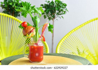 bloody mary drink with burger