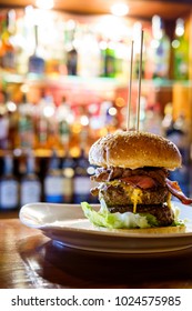 Fancy Burger And Restaurant In The Background