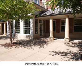 Fancy Doors By A Shaded Building Entrance