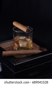 Fancy An Evening Of Bourbon And Cigars? Black Background
