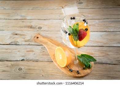 fancy gin and tonic selection drink alcohol cocktail craft fresh fruit spices mint glass bar raspberry 