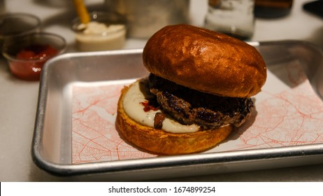 Fancy Hamburger On A Steel Plate 