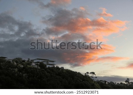 Fancy house with nice clouds