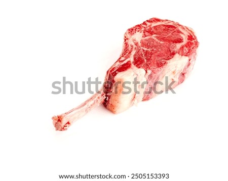 Fancy tomahawk steak on the bone on white background. Premium high quality beef cut product. Craft and expensive meat production.