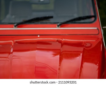 Fancy Vintage Red Car Classic Automobile 1974 French Exterior Close Up Shiny Red Paint, Smooth Curvy Lines Beautiful Car