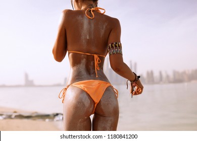 Fancy young girl on the beach in bikini, swimming in the sea, Dubai, surfing, surfboard, bronze tan, fruits, sport, holiday, summertime, hot, free, reckless, funny, perfect body, sunshine, soft skin