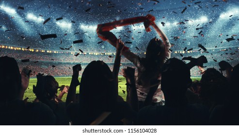 Fans Celebrating The Success Of Their Favorite Sports Team On The Stands Of The Professional Stadium While It's Snowing. Stadium Is Made In 3D.