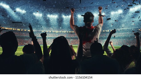 Fans Celebrating The Success Of Their Favorite Sports Team On The Stands Of The Professional Stadium While It's Snowing. Stadium Is Made In 3D.