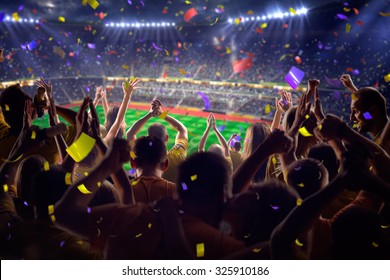 Fans on stadium game  - Shutterstock ID 325910186