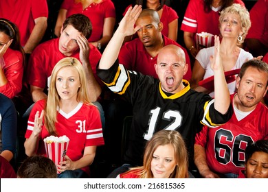 Fans: Opposing Football Team Fan Signals Touchdown