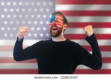 fans of the usa soccer team celebrate winning a match during the world championships; happy usa football fans with painted faces and the usa flag in the background - Powered by Shutterstock