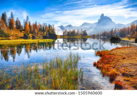Fantastic autumn landscape. View on Federa Lake early in the morning at autumn. Location: Federa lake with Dolomites peak, Cortina DAmpezzo, South Tyrol, Dolomites, Italy, Europe