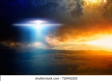 Fantastic Background - Extraterrestrial Aliens Spaceship, Ufo  In Red Glowing Sky. Elements Of This Image Furnished By NASA