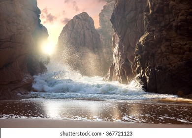Fantastic big rocks and ocean waves at sundown time. Dramatic scene. Beauty world landscape.