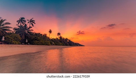 Fantastic closeup view of calm sea water waves with orange sunrise sunset sunlight. Tropical island beach landscape, exotic shore coast. Summer vacation, holiday amazing nature scenic. Relax paradise - Powered by Shutterstock