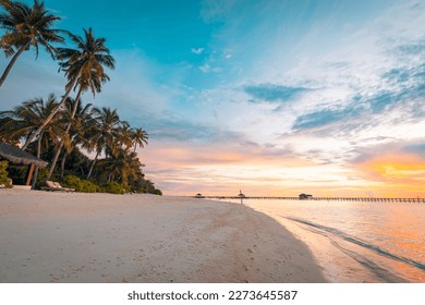 Fantastic closeup view of calm sea water waves with orange sunrise sunset sunlight. Tropical island beach landscape, exotic shore coast. Summer vacation, holiday amazing nature scenic. Relax paradise

