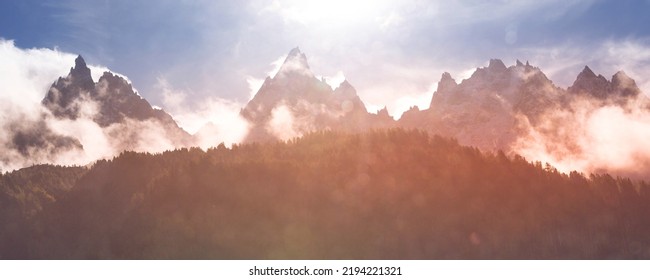 Fantastic Evening Snow Mountains Banner Landscape Background. Colorful Pink And Blue Clouds Overcast Sky. French Alps, Chamonix Mont-Blanc, France