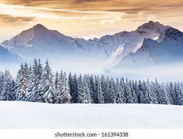 Fantastic evening winter landscape. Dramatic overcast sky. Creative collage. Beauty world. - Powered by Shutterstock