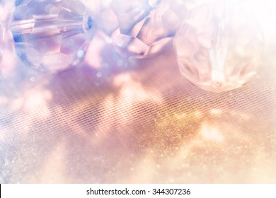 Fantastic festive background with beads and ice