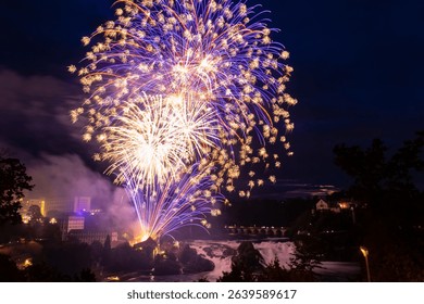 Fantastic fireworks at the Rhine Falls during the Swiss National Day celebrations on August 1 in Neuhausen am Rheinfall, Schaffhausen canton, Switzerland