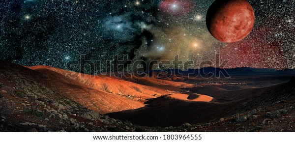 Fantastic\
landscape of another planet. Desert Night with stars and galaxies \
(Elements of this image furnished by\
NASA)