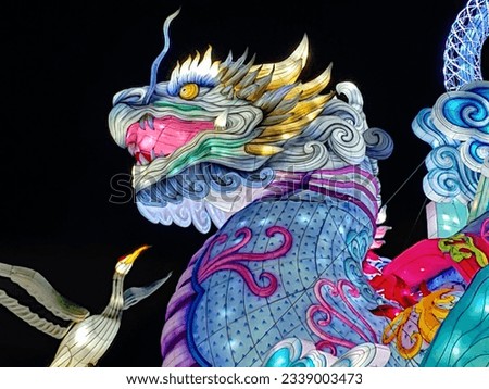 Fantastic lighted dragon sculpture shines bright