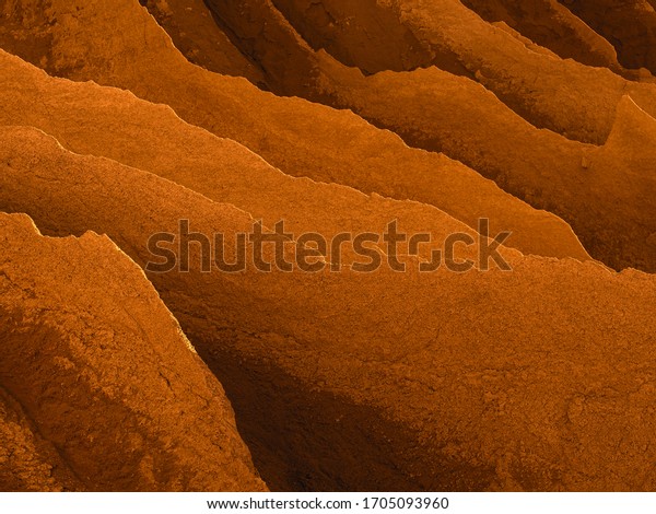 Fantastic martian landscape. A Deserted terrestial\
planet in orange colors. abandoned Quarry Of Rummu, Estonia. Scenic\
View Of Land. Mountain of white sand.and stones. Panoramic View.\
The erosion of
