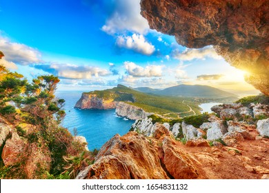 Fantastic morning view on Cacccia cape. View from the cave on the cliff. Fantastic Mediterranean seascape. Location: Alghero, Province of Sassari, Italy, Europe