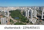 Fantastic panoramic view of Areiao Park in Goiania with lakes, native trees and modern buildings surrounding the park in May, 2023. Goiania, Goias, Brazil 