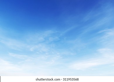 Fantastic Soft White Clouds Against Blue Sky Background.